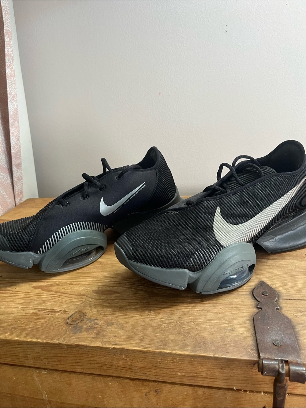 Nike Men’s Black Sneakers with White Swoosh